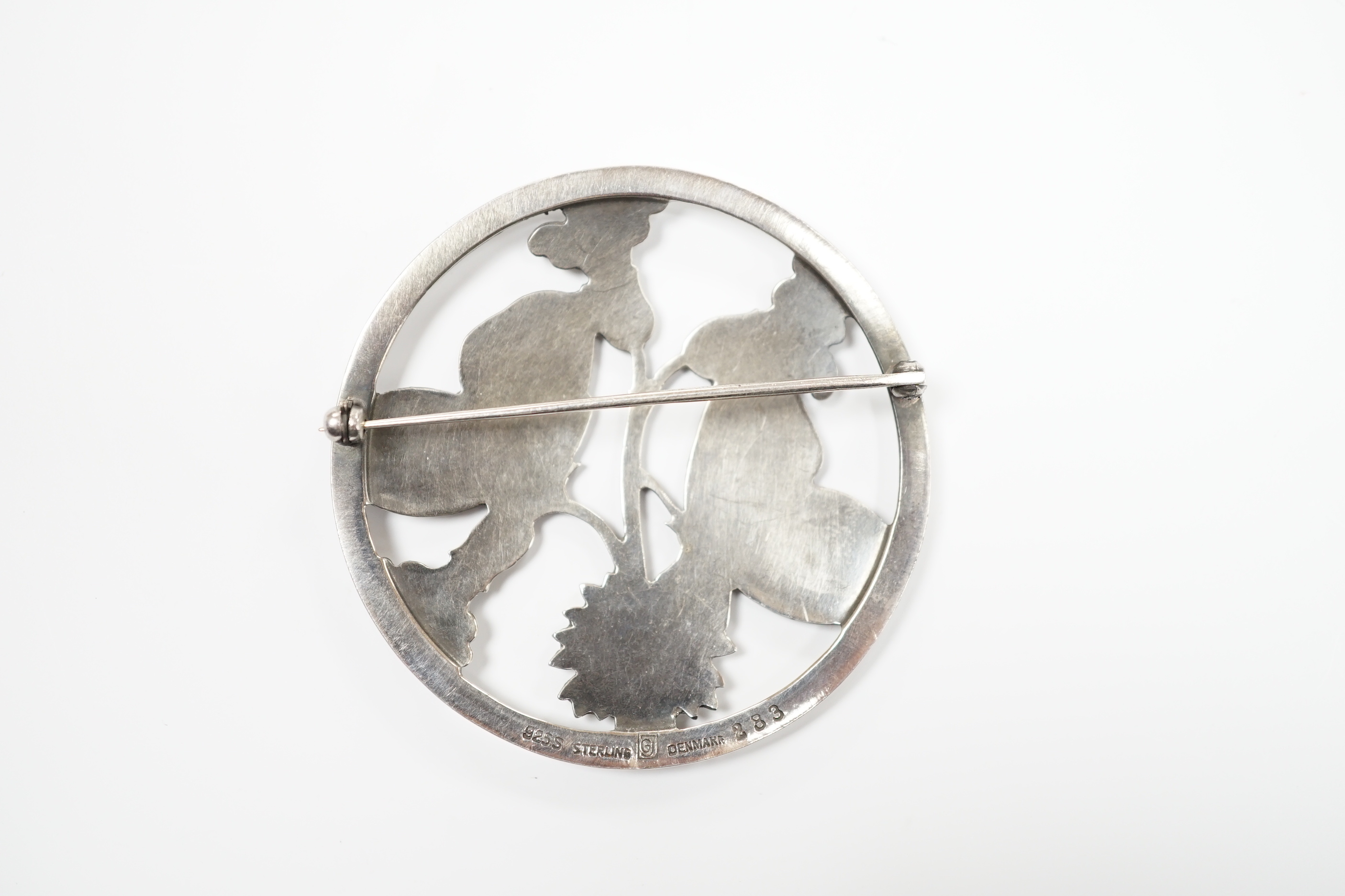 A George Jensen sterling ' butterflies amid foliage' circular brooch, design no. 283, 52mm.